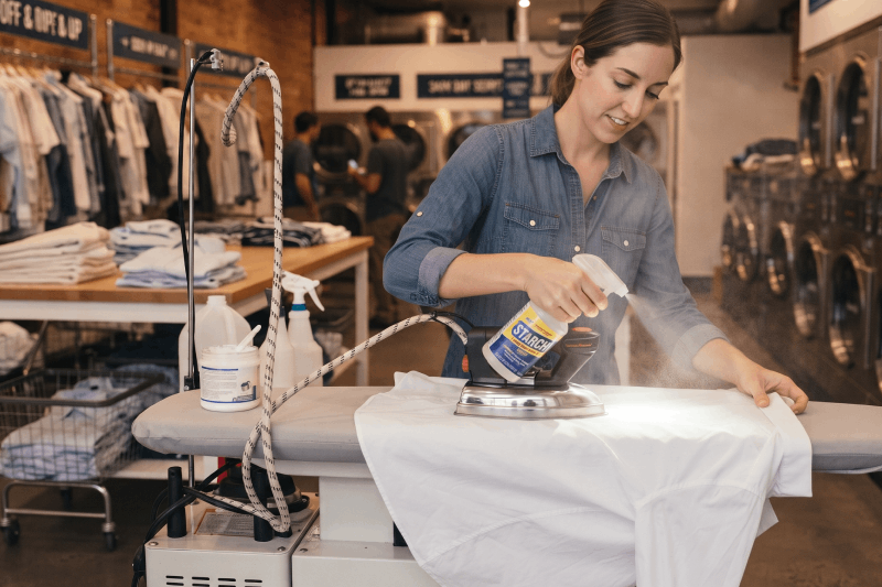 A clean white dress on a hanger